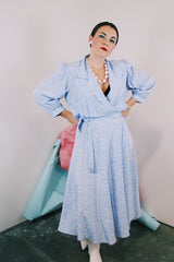 Women's vintage 1980's Argenti Pure label 3/4 arm length baby blue midi length wrap dress with all over white print and a double lapel