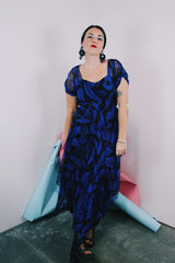 Women's vintage 1940's capped sleeve ankle length dress in black with all over cobalt blue print