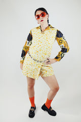 sleeveless orange and green floral print romper in cotton vintage 1960's