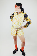 sleeveless orange and green floral print romper in cotton vintage 1960's