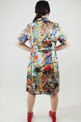 all over floral print short sleeve knee length dress with front half zipper and matching tie belt vintage 1970's