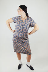 black and brown abstract print short sleeve mid length zip up dress vintage 1960's