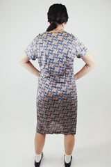 black and brown abstract print short sleeve mid length zip up dress vintage 1960's