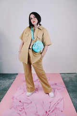 short sleeve button up and matching pants set in beige ribbed polyester vintage men's 1970's