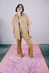 short sleeve button up and matching pants set in beige ribbed polyester vintage men's 1970's