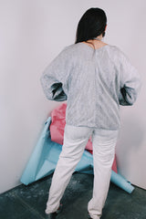 Women's vintage 1970's Saks Alley label long sleeve silver metallic blouse with fringe trim on cuffs and hem