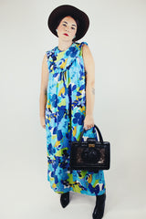 sleeveless floral printed maxi dress with ruffle and bow trim vintage 1960's