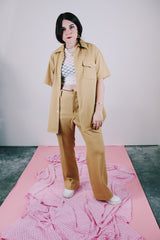 short sleeve button up and matching pants set in beige ribbed polyester vintage men's 1970's