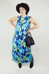 sleeveless floral printed maxi dress with ruffle and bow trim vintage 1960's