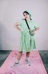 short sleeve knee length green and blue printed babydoll dress vintage women's 1950's