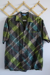 Women's or men's vintage 1970's Sportsman by Cal-Made California short sleeve printed button up shirt with collar.