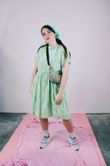 short sleeve knee length green and blue printed babydoll dress vintage women's 1950's