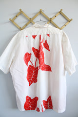 Men's vintage XL 1980's Yoyo's Hawaii, Made in USA label short sleeve white cotton shirt with collar and half button closure.