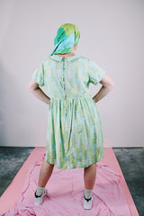 short sleeve knee length green and blue printed babydoll dress vintage women's 1950's