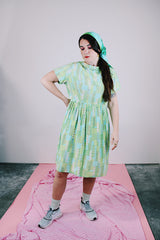 short sleeve knee length green and blue printed babydoll dress vintage women's 1950's