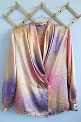 Women's vintage 1980's Impressions of California, Made in USA label long sleeve slinky silk like blouse with double breasted closure in orange, purple, and pink.