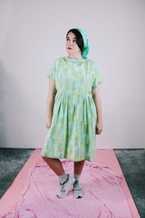 short sleeve knee length green and blue printed babydoll dress vintage women's 1950's