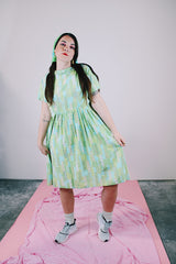short sleeve knee length green and blue printed babydoll dress vintage women's 1950's
