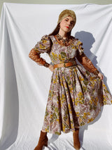 purple and green floral printed midi length dress with short sleeve puff sleeves buttons up the front vintage 1980's