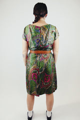short sleeve printed knee length dress in forest green with pink and brown print