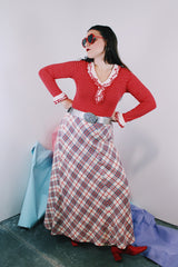 Women's vintage 1970's ankle length maxi skirt in acrylic material. White with red, navy, and silver metallic plaid print all over