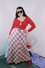 Women's vintage 1970's ankle length maxi skirt in acrylic material. White with red, navy, and silver metallic plaid print all over
