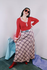 Women's vintage 1970's ankle length maxi skirt in acrylic material. White with red, navy, and silver metallic plaid print all over
