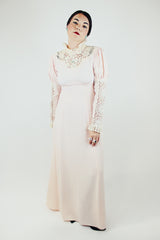 long sleeve light pink maxi dress with crochet lace details and tie belt vintage 1940's