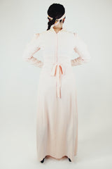 long sleeve light pink maxi dress with crochet lace details and tie belt vintage 1940's