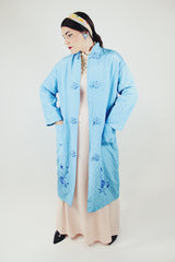 blue long sleeve long length quilted duster jacket with embroidered flowers vintage 1960's