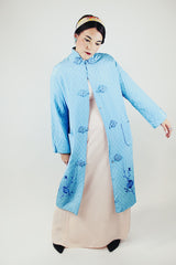 blue long sleeve long length quilted duster jacket with embroidered flowers vintage 1960's