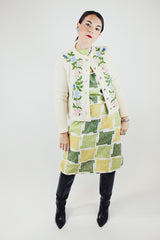 long sleeve cream colored wool cardigan with embroidered flowers and silver buttons vintage 1960's