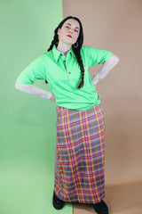 Women's vintage 1970's ankle length maxi skirt in an acrylic material with plaid print and a-line shape.