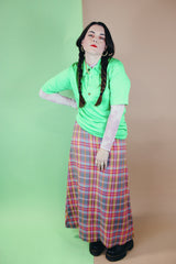 Women's or men's vintage 1970's Designed by David Harrison label short sleeve half button shirt with pointy collar in a bright vibrant green color.