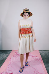 sleeveless knee length dress in tan with floral print in the middle linen vintage 1960's