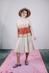 sleeveless knee length dress in tan with floral print in the middle linen vintage 1960's