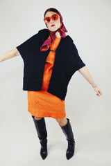 textured boucle black shawl with one closure longer in the front vintage 1940's