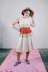 sleeveless knee length dress in tan with floral print in the middle linen vintage 1960's