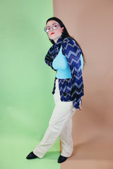 Women's or men's vintage 1970's Roland label long sleeve button up shirt with a pointy collar in navy slinky polyester with a zig zag print.