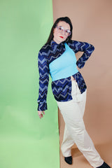 Women's or men's vintage 1970's Roland label long sleeve button up shirt with a pointy collar in navy slinky polyester with a zig zag print.