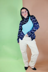 Women's or men's vintage 1970's Roland label long sleeve button up shirt with a pointy collar in navy slinky polyester with a zig zag print.