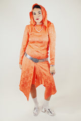 long sleeve orange silk dress with polka dot print and asymmetrical hem vintage 1980's