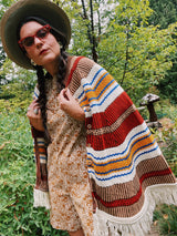 striped knit poncho with buttons and fringe hem women's vintage 1970's