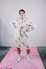 long sleeve midi length dress with tie waist and tunic neckline cream with print vintage 1970's