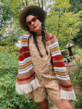 striped knit poncho with buttons and fringe hem women's vintage 1970's