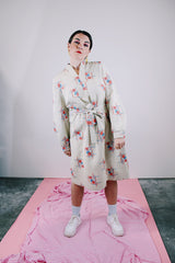 long sleeve midi length dress with tie waist and tunic neckline cream with print vintage 1970's