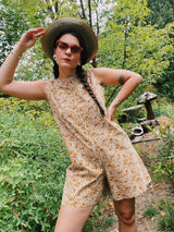 sleeveless brown and cream printed romper with zipper in the back short length women's vintage 1960's