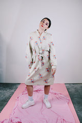 long sleeve midi length dress with tie waist and tunic neckline cream with print vintage 1970's