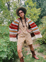 striped knit poncho with buttons and fringe hem women's vintage 1970's