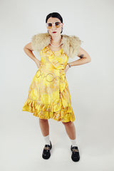sleeveless knee length floral print yellow dress with ruffle trim vintage 1960s